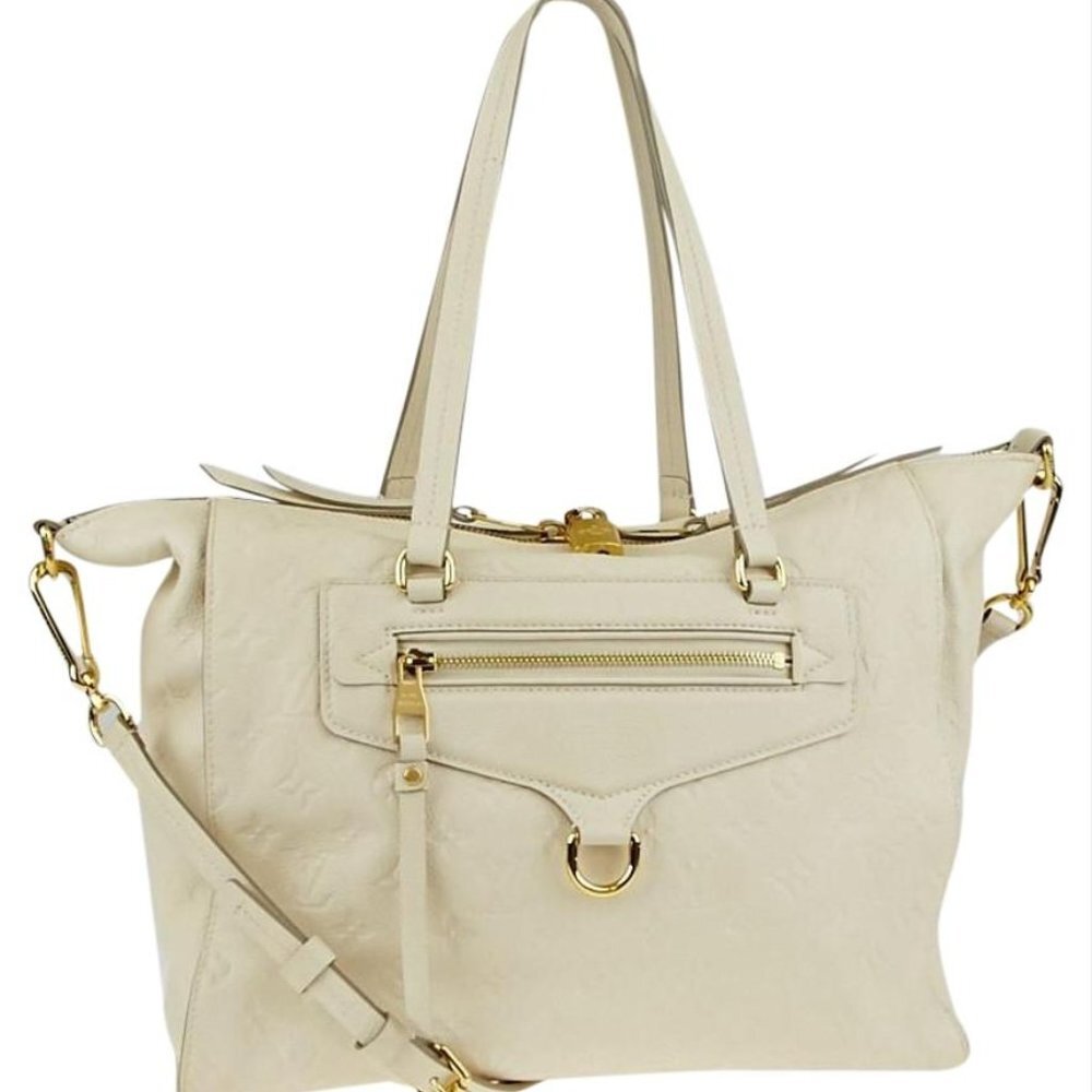 Louis Vuitton Neige Ivory Empreinte Leather Lumine